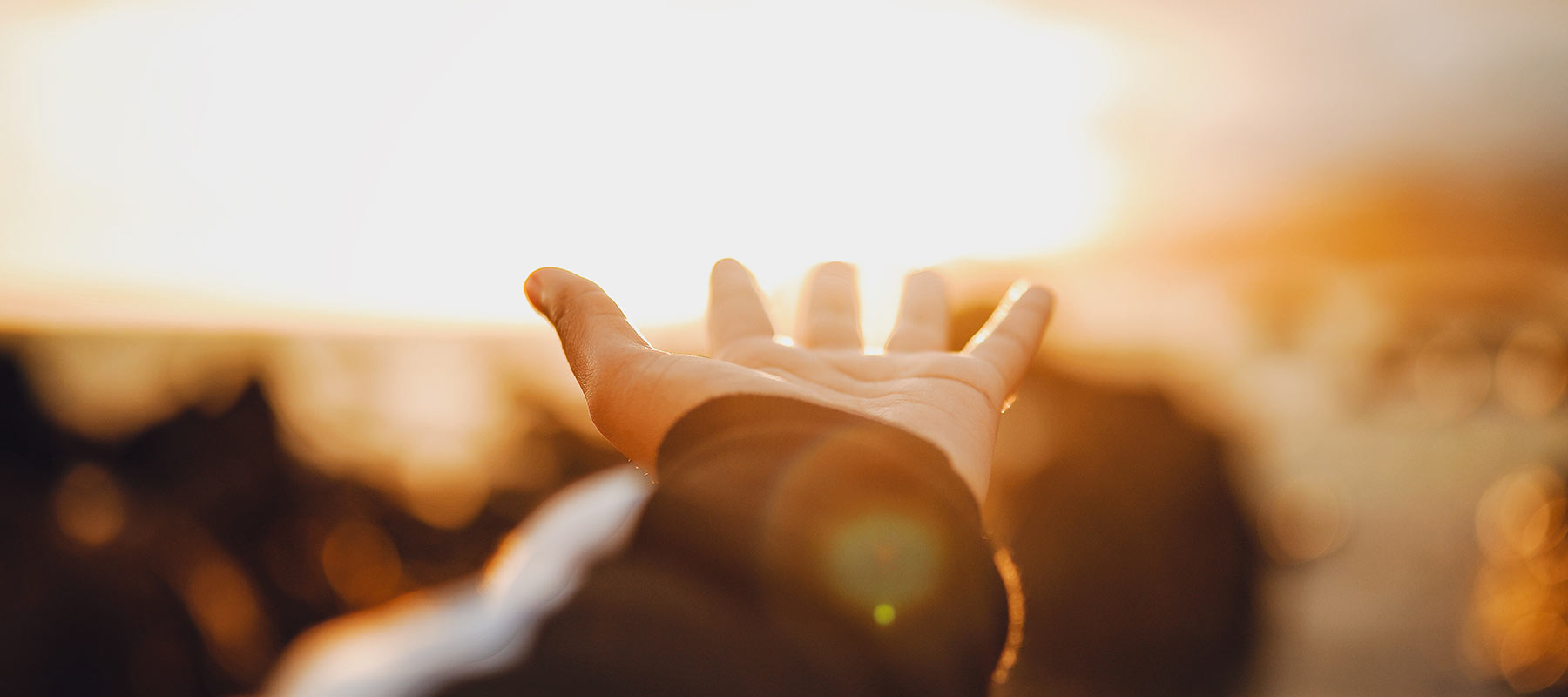 Outstretched hand towards the heavens